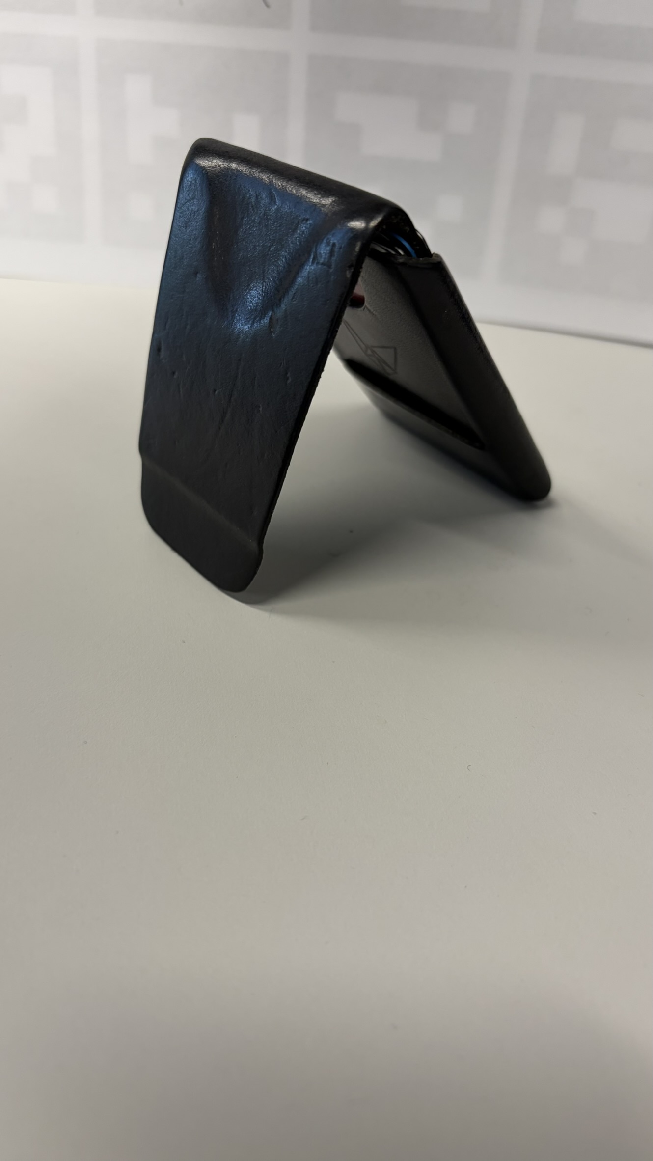 Side profile of open leather wallet