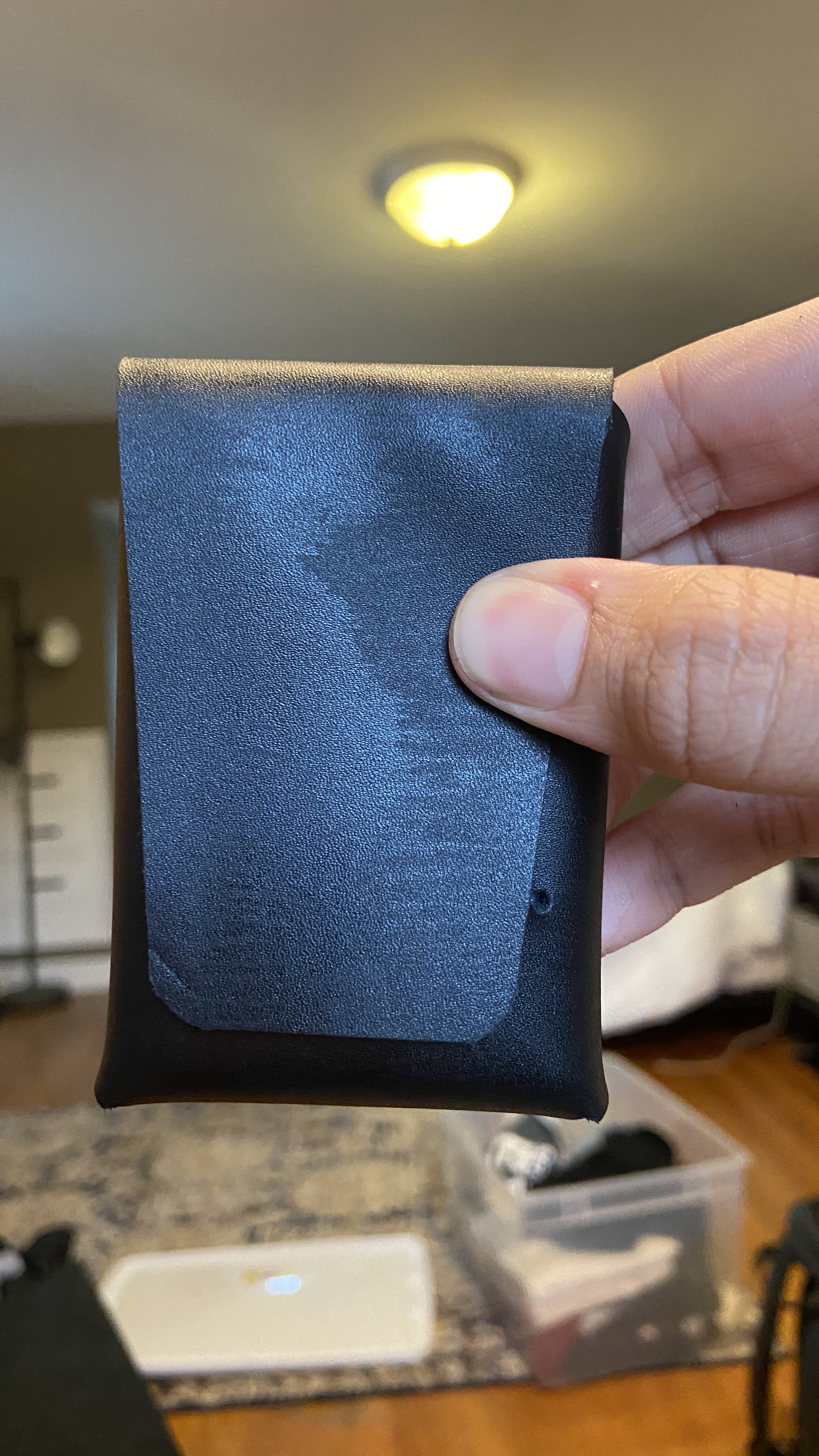 Side profile of open leather wallet